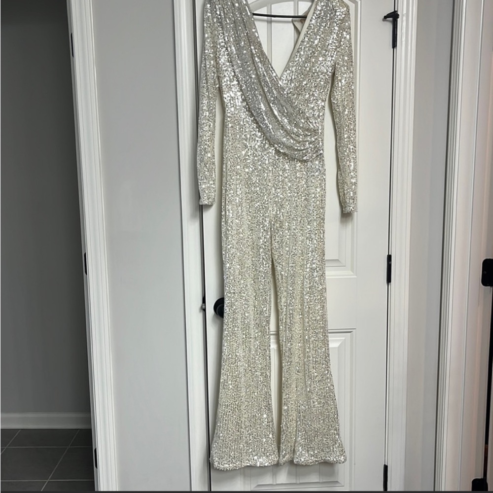 Here For The Party sequin jumpsuit from Bella And Bloom Boutique